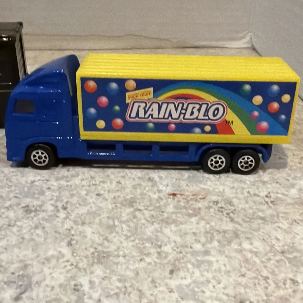 Diecast Truck Lot – RAIN-BLO Semi, UPS Truck, Crayon Rig, Ford GT – 4 pcs